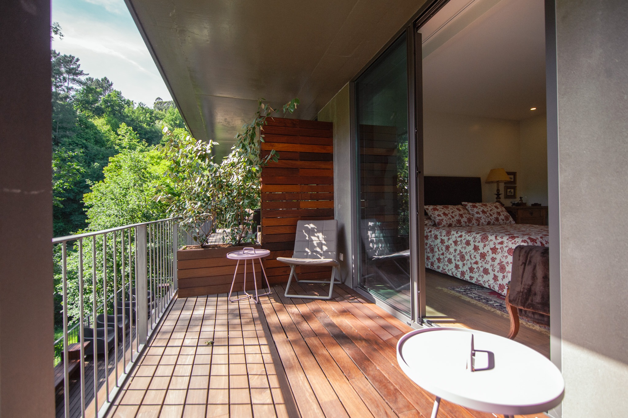 rivate terrace with chair and table connected to a room at Runas Carqueijais in Gerês