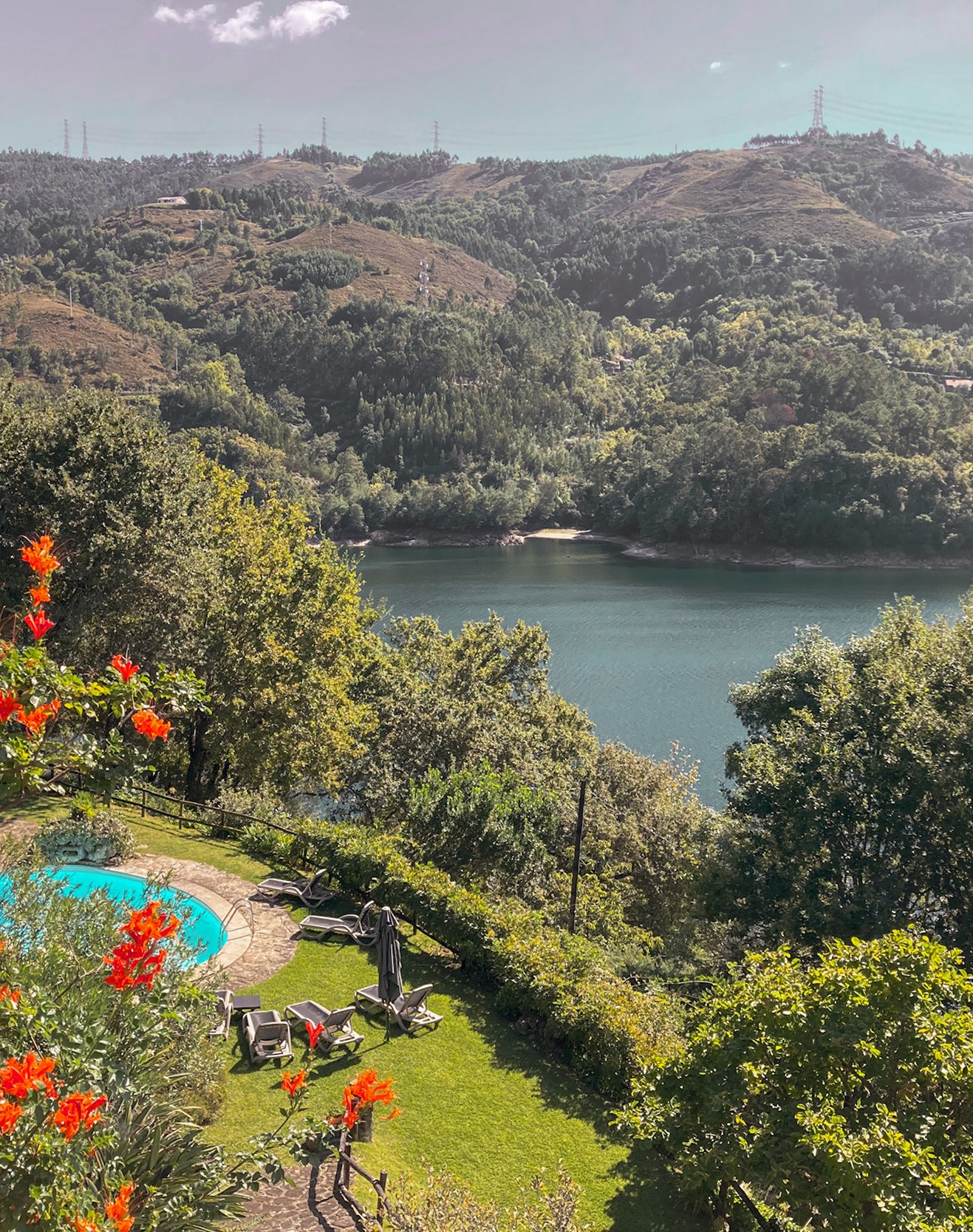 View over the lake and gardens at Runas Carqueijais in Gerês